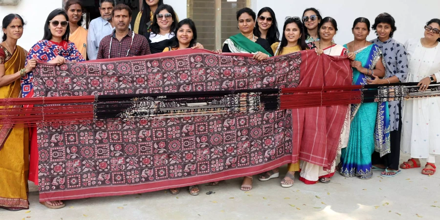 FLO members interact with weavers of dying art Telia Rumal of Puttapaka